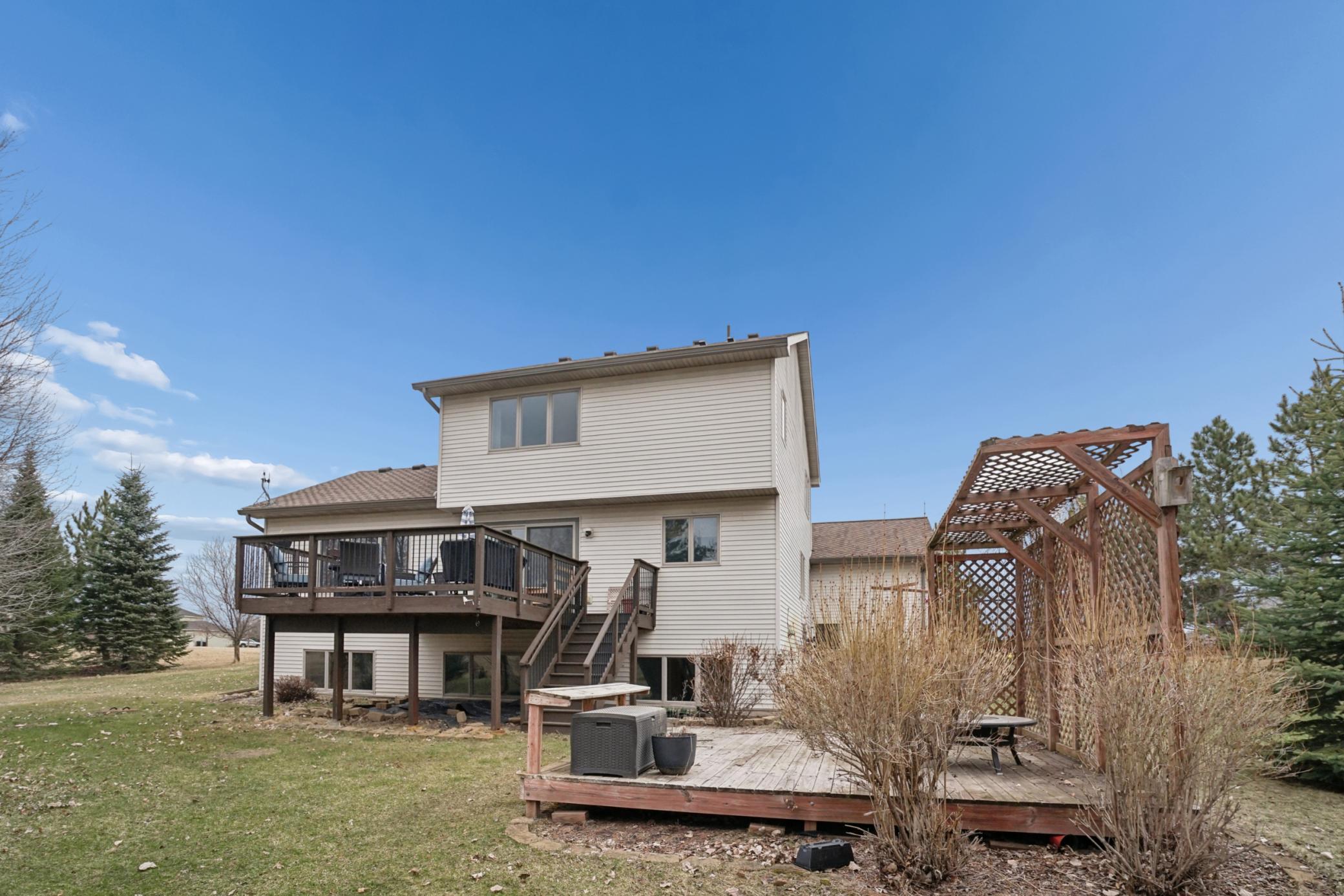 Rear view! Dual decks! This backyard is ready to entertain!