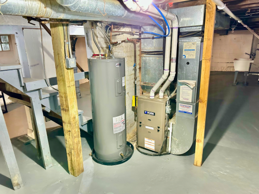 Dedicated mechanical area in the basement with furnace and water heater.