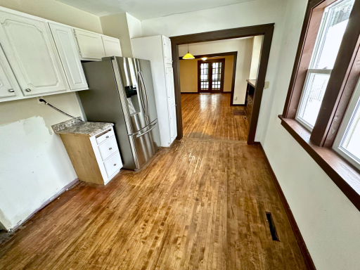 Spacious kitchen footprint with great natural lightâready for customization and value-add improvements.