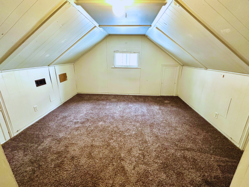 Finished upper levelâperfect for a bedroom, office, or creative space.