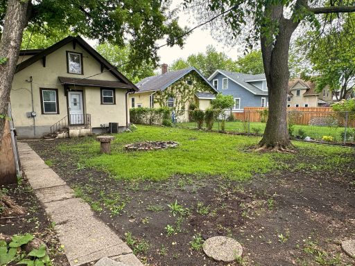 Deep lot with mature trees and plenty of space to enjoy, garden, or expand.