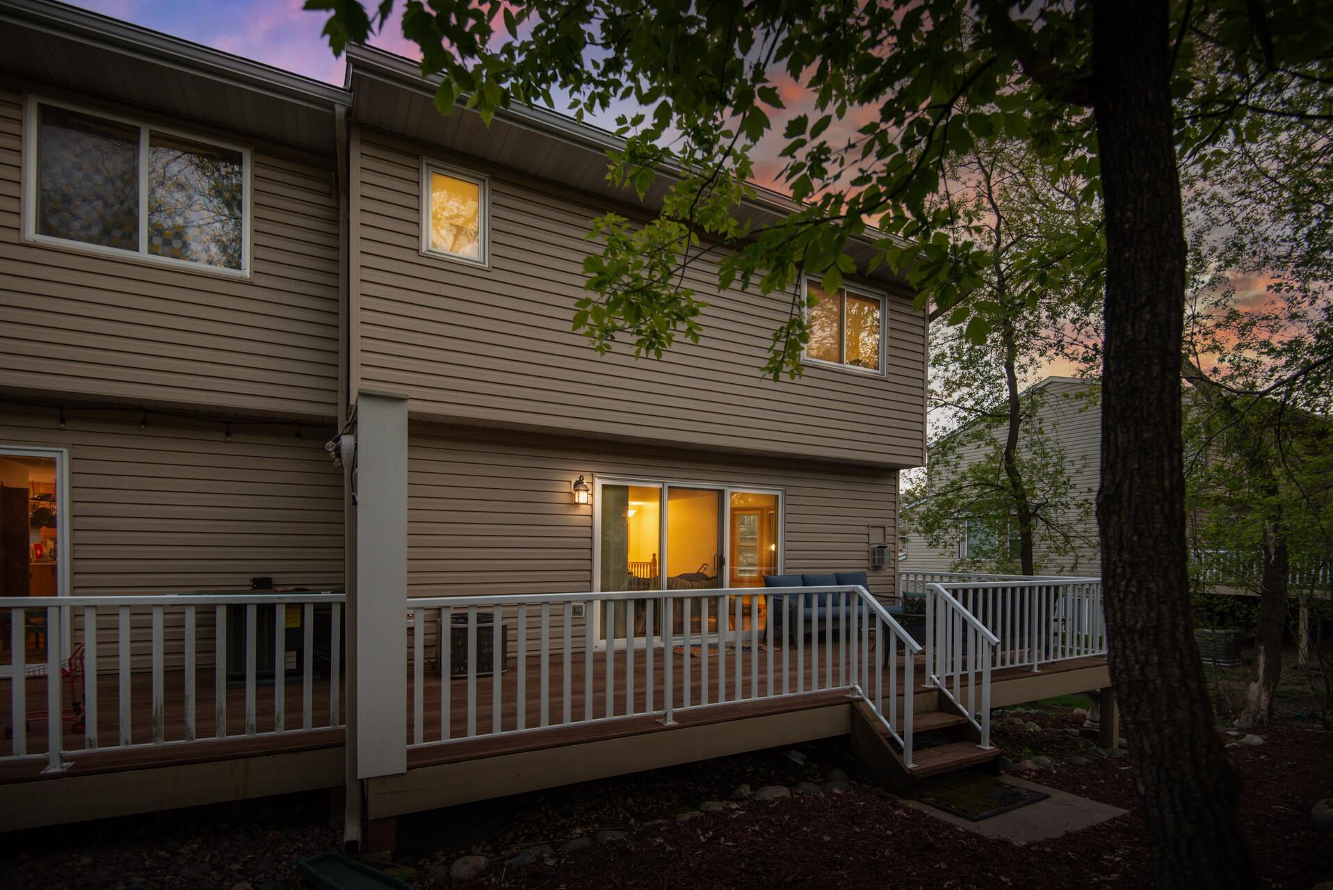Metal railing and freshly refinished deck boards