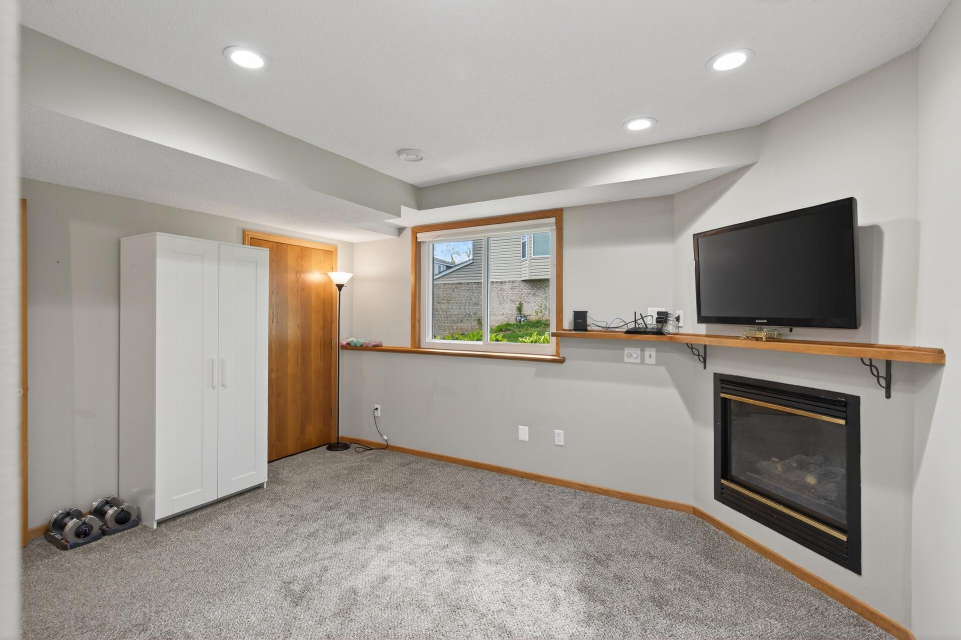 Lots of room to relax and entertain with a gas fireplace.