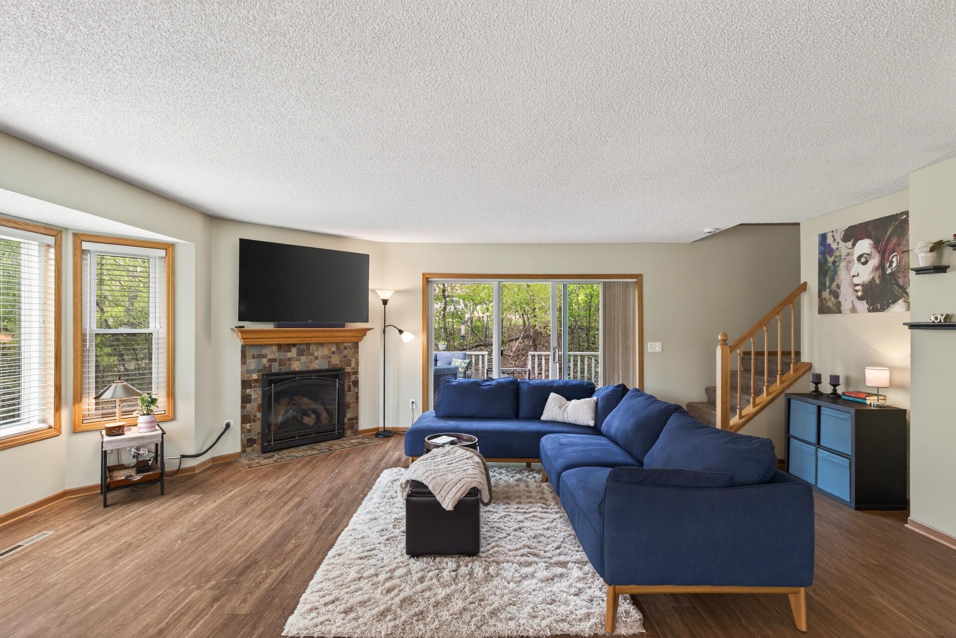 Gas fireplace with lots of natural light.