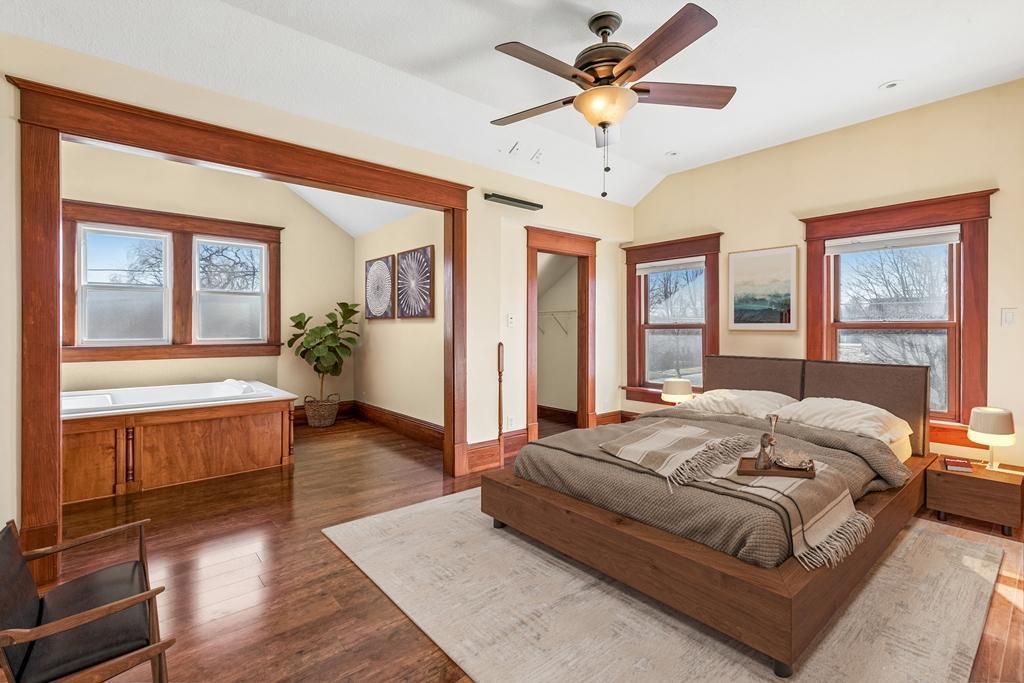 38 virtually staged primary en suite bedroom.jpg