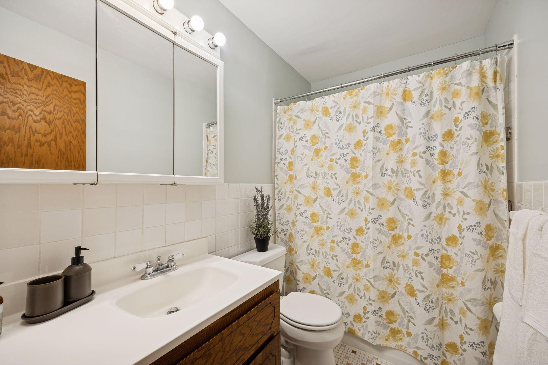Enjoy a generous bathroom with a tub/shower combination, offering comfort, convenience, and plenty of space to get ready.