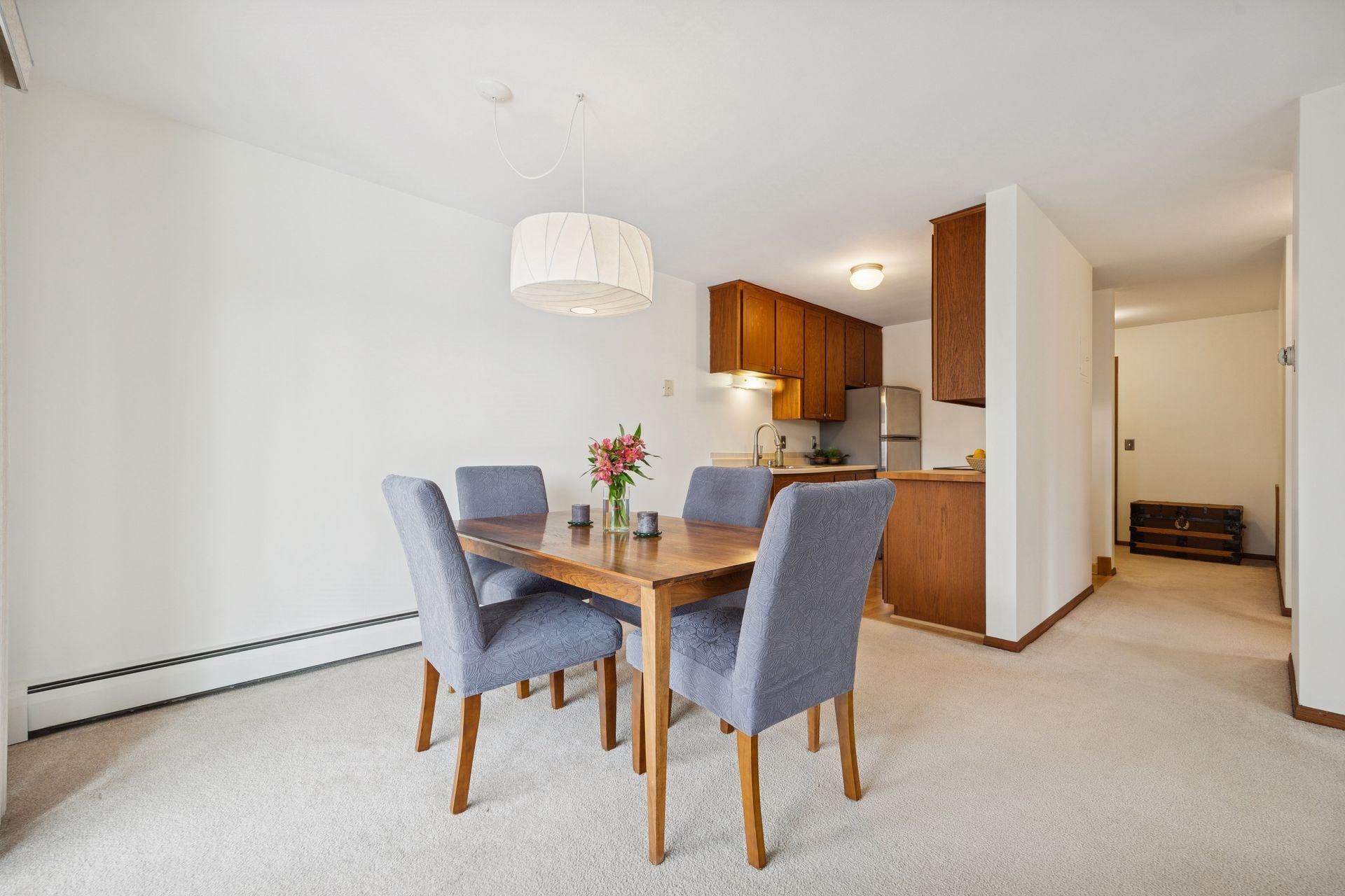 A great “heart of the home” moment: dining room + adjacent kitchen for a layout that’s practical and open.