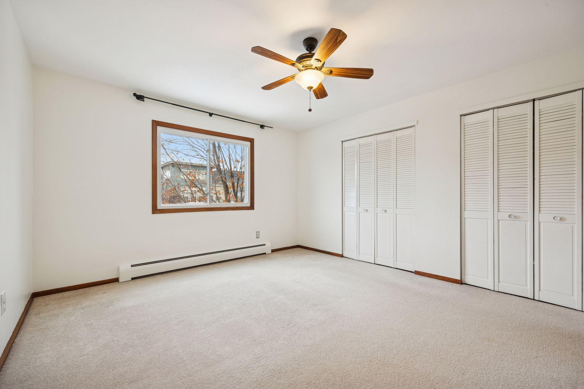 Fresh, simple, and full of potential. This spacious bedroom is the perfect canvas for a new buyer to make it their own.