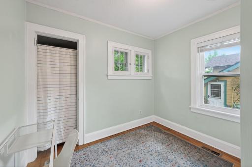 First bedroom that is bright and has a built-in Murphy bed that stays with the house!