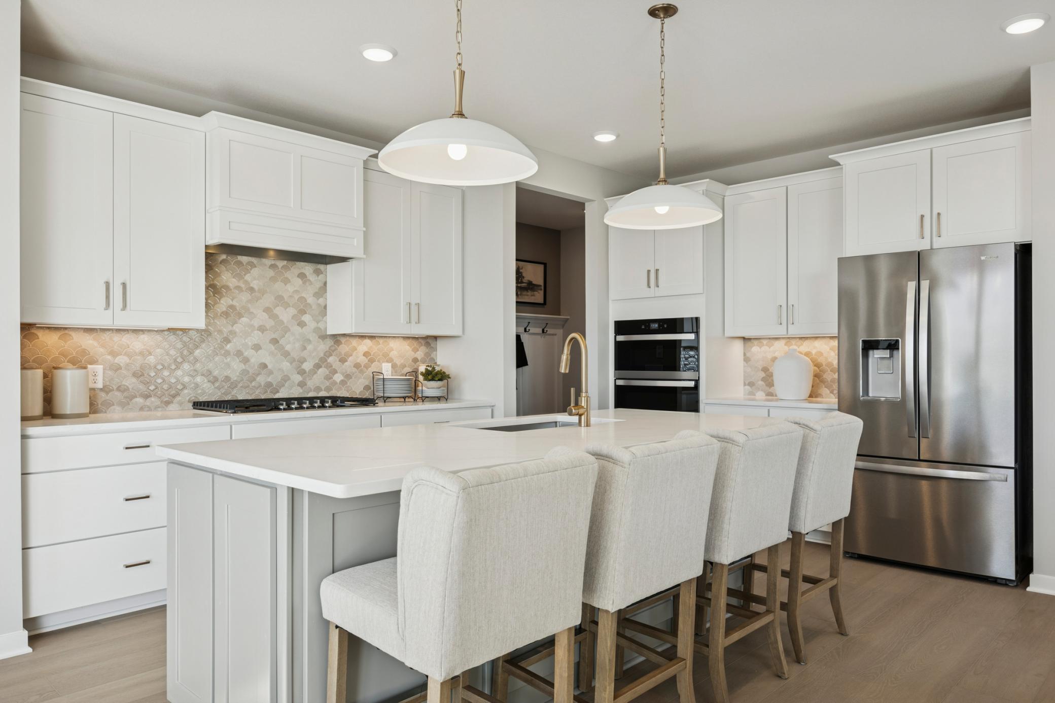 Bright and spacious kitchen featuring ample cabinetry, sleek countertops, and a functional layout—perfect for everyday living and entertaining.