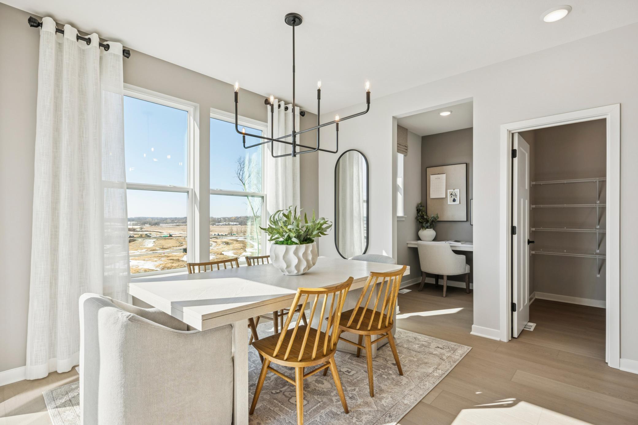 Charming dinette tucked just off the kitchen—ideal for casual meals, morning coffee, or intimate gatherings.