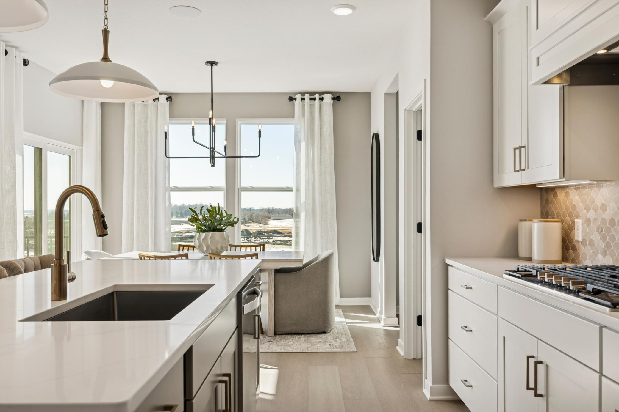 Open-concept design allows seamless flow from the kitchen to dining and living spaces—ideal for hosting and connection