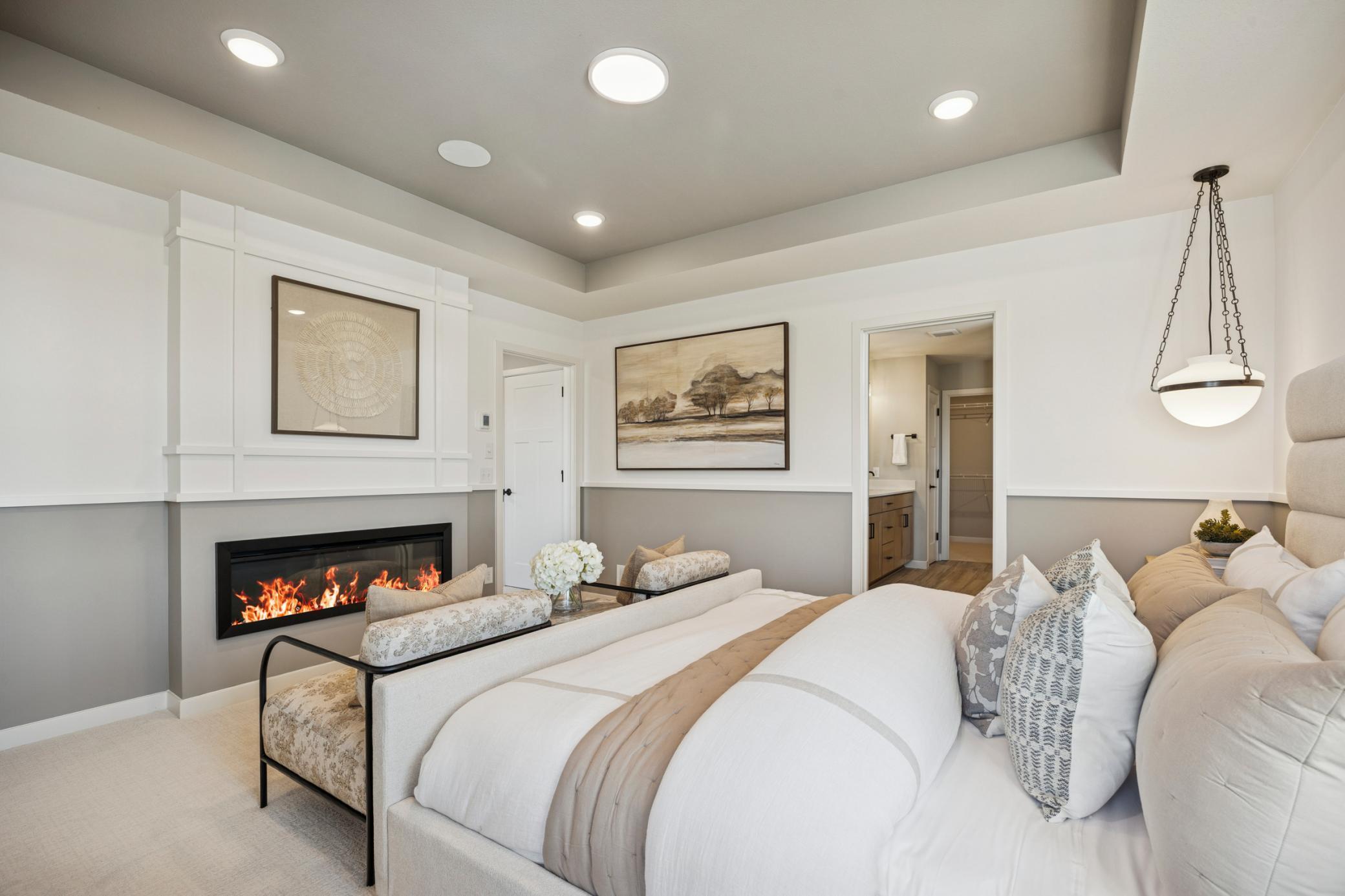 Spacious and serene, this primary bedroom offers a relaxing retreat at the end of the day. With generous square footage, soft natural light, the room promotes both rest and quiet moments of retreat.