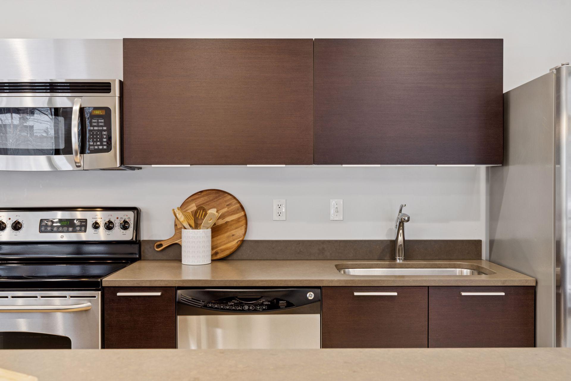 The kitchen area features Italian Valcucine cabinets & quartz countertops