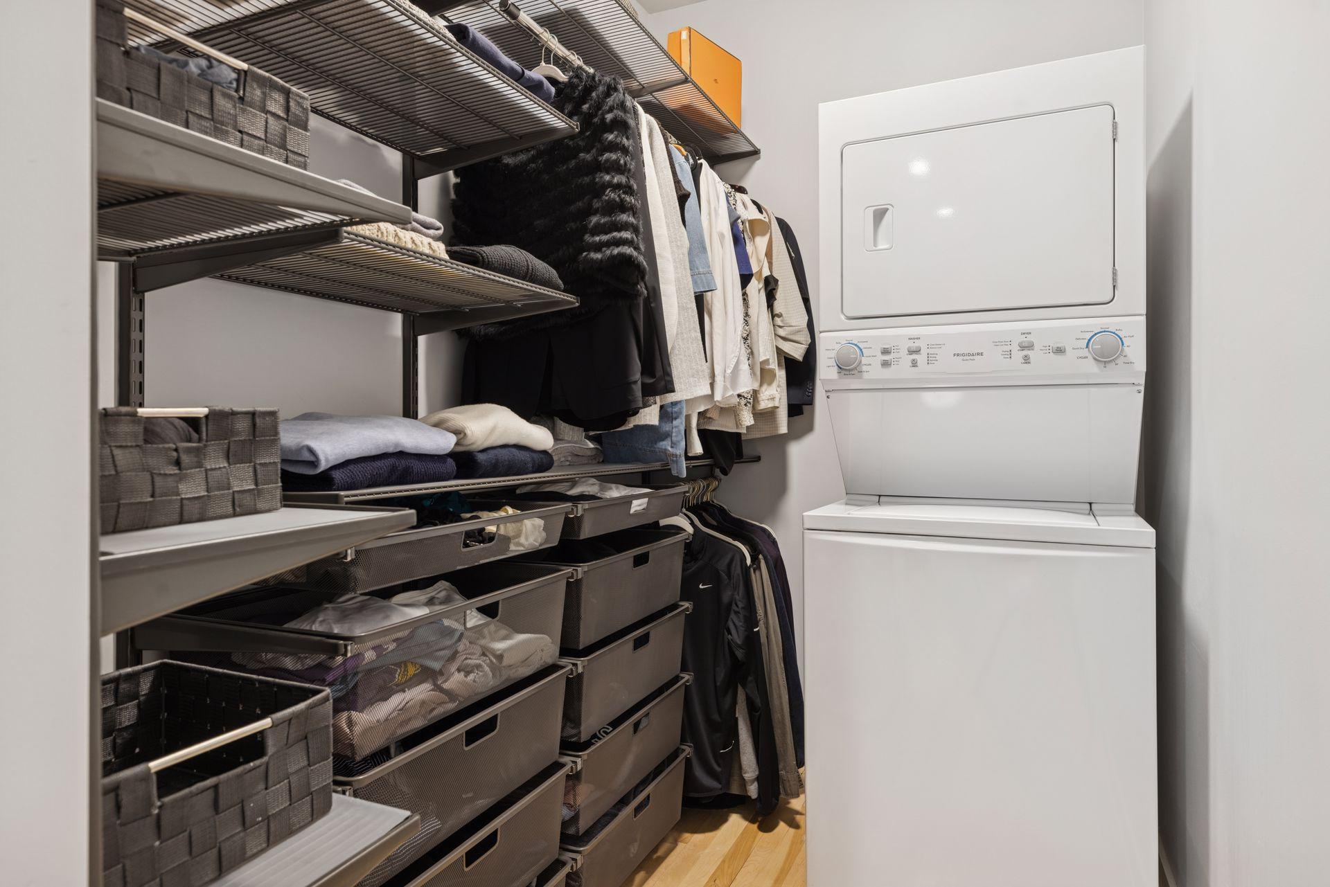 The large primary suite includes an impressive walk-in closet and in-unit laundry.