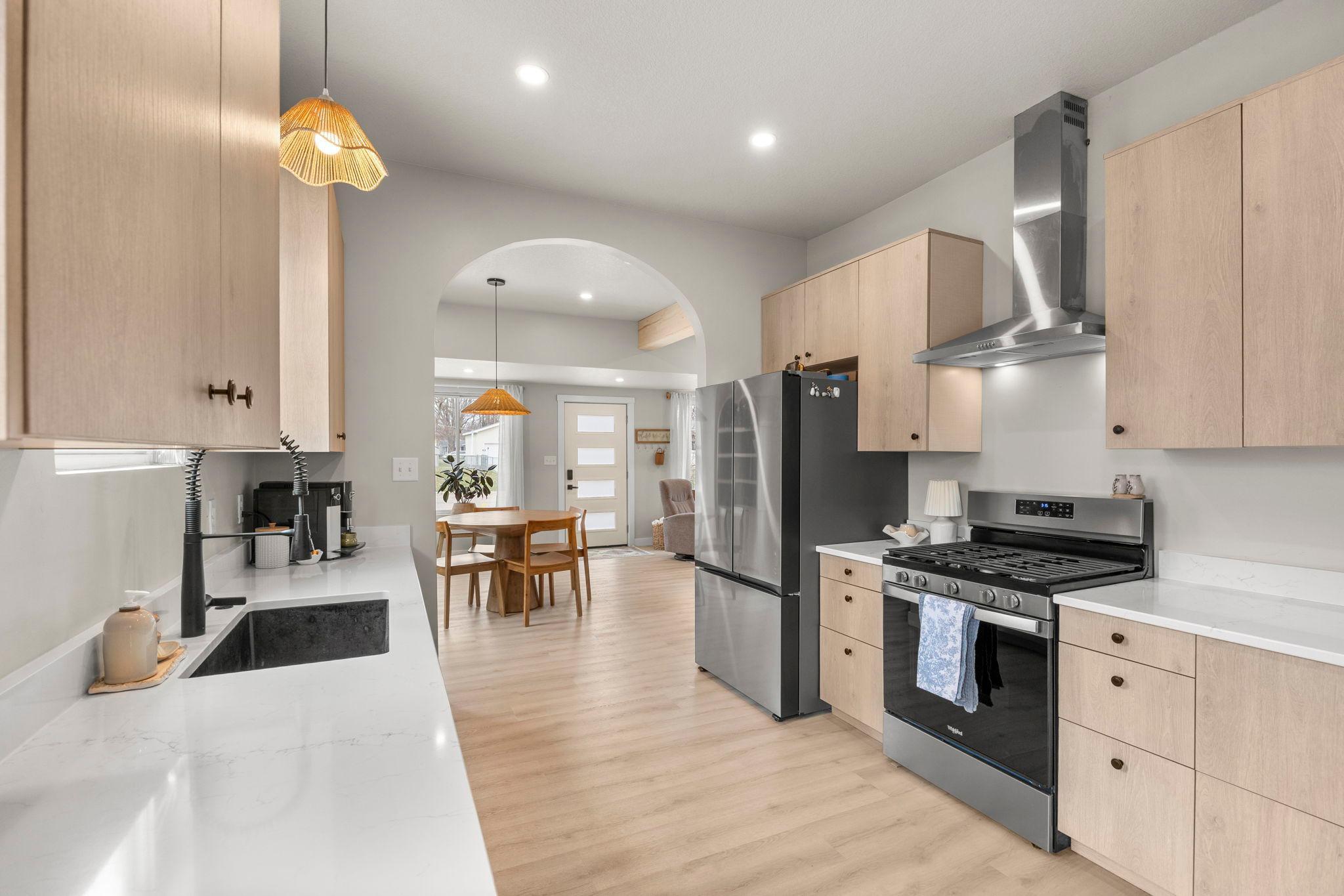 Another stunning view of the kitchen, showcasing the nearby dining area.
