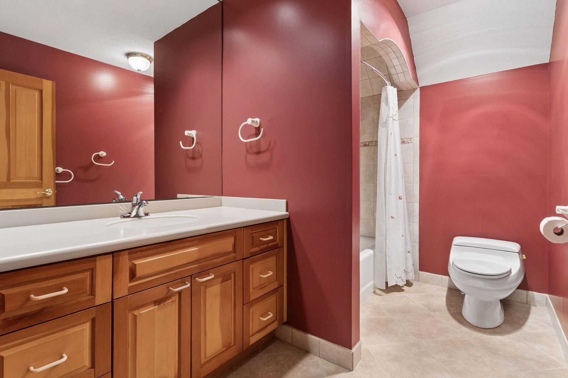 A full hall bathroom completes the upper level.