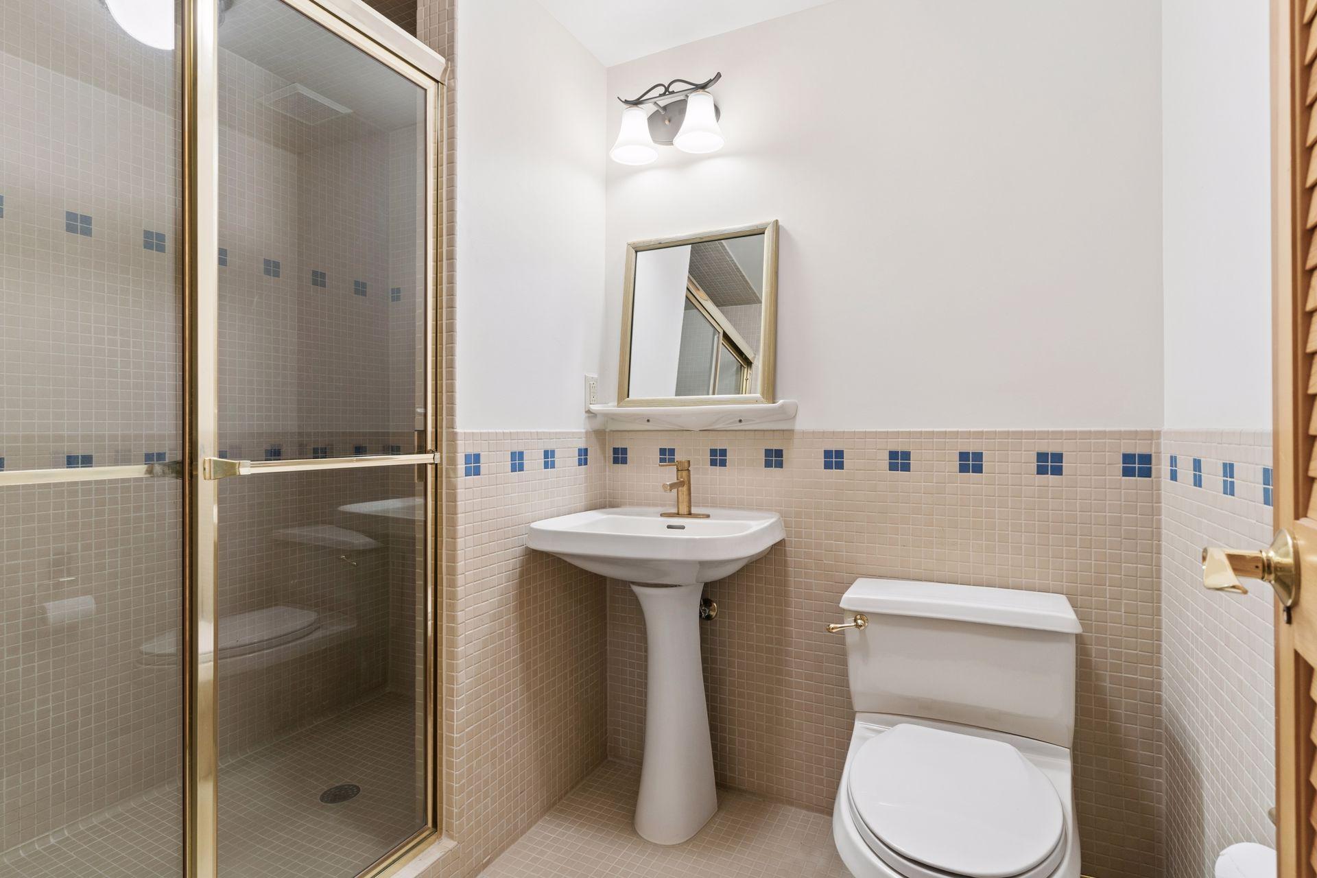 A 3/4 Bathroom sits just off the athletic court - great for grabbing a hot shower after a game of basketball!