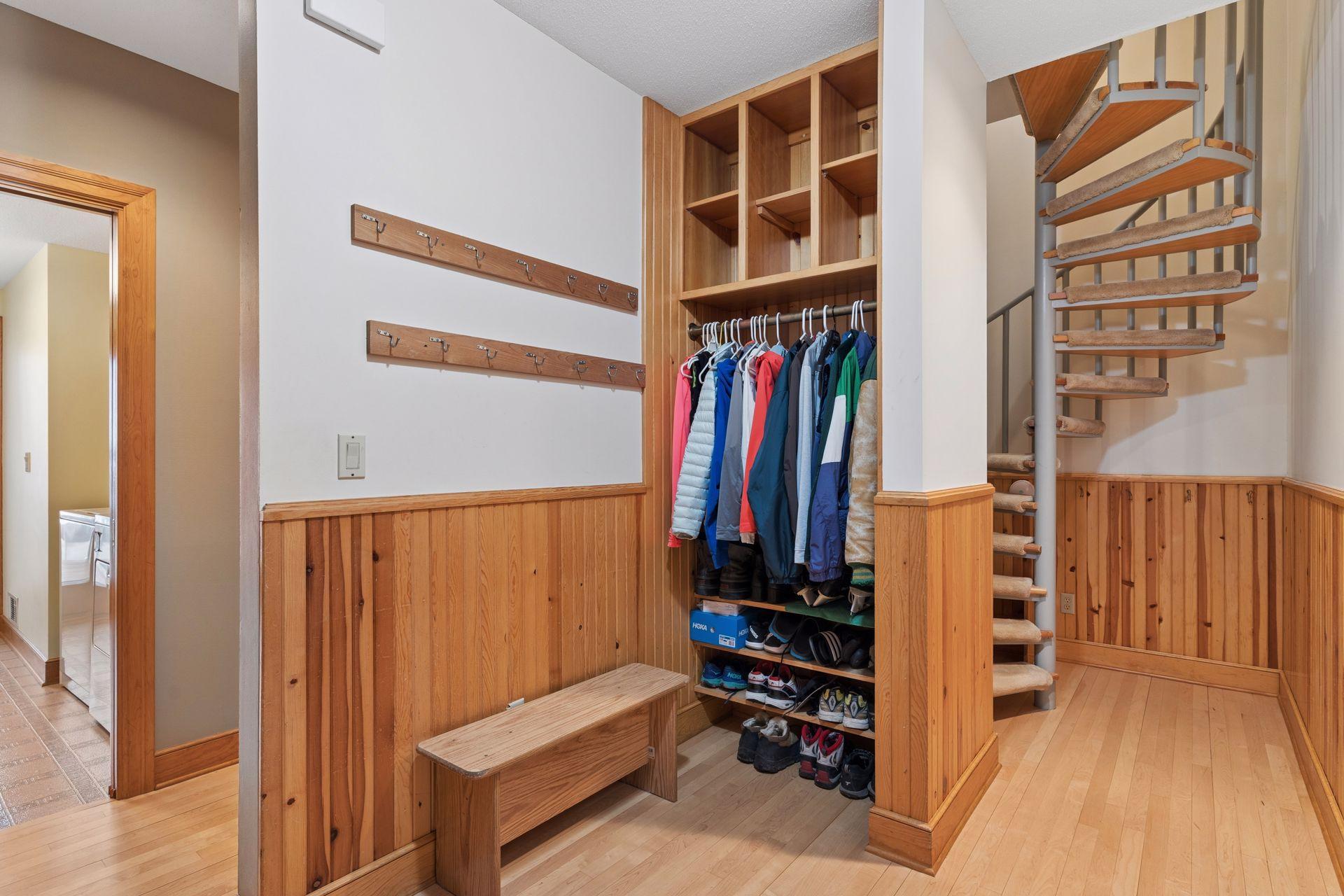 There is room for all your hats and mittens! The spiral staircase leads to the upper level.