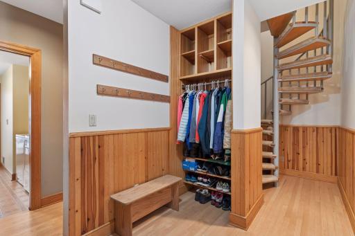 There is room for all your hats and mittens! The spiral staircase leads to the upper level.