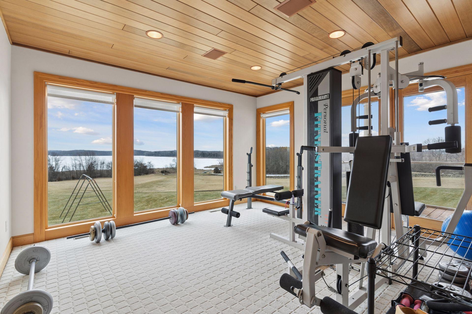 Located on the main level is the home Exercise Room - imagine working out with these views!