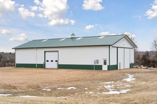 A Morton Building sits near the home.