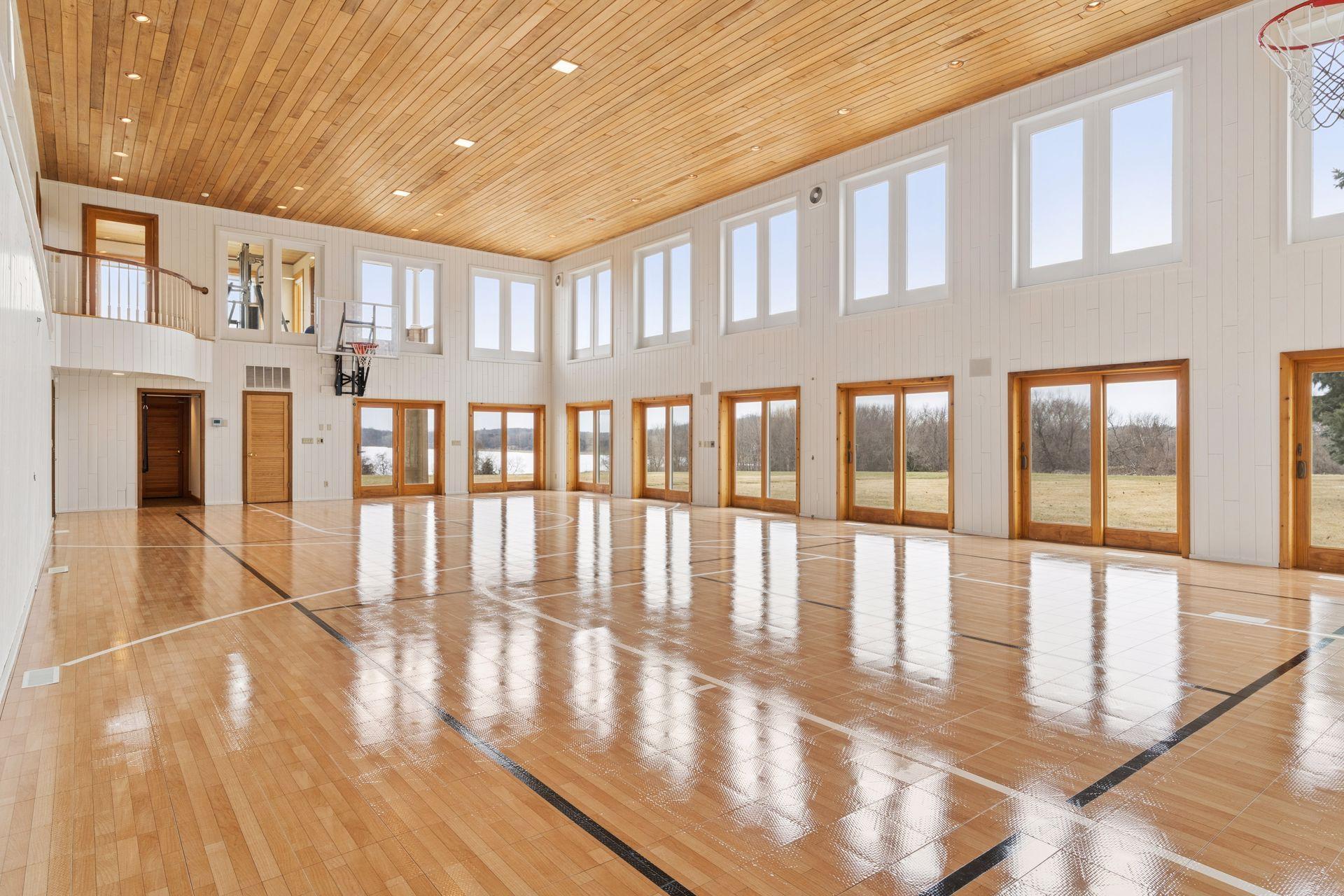 Under the flooring is a drained swimming pool basin - all the mechanicals are in place and the room could be converted back into a pool.