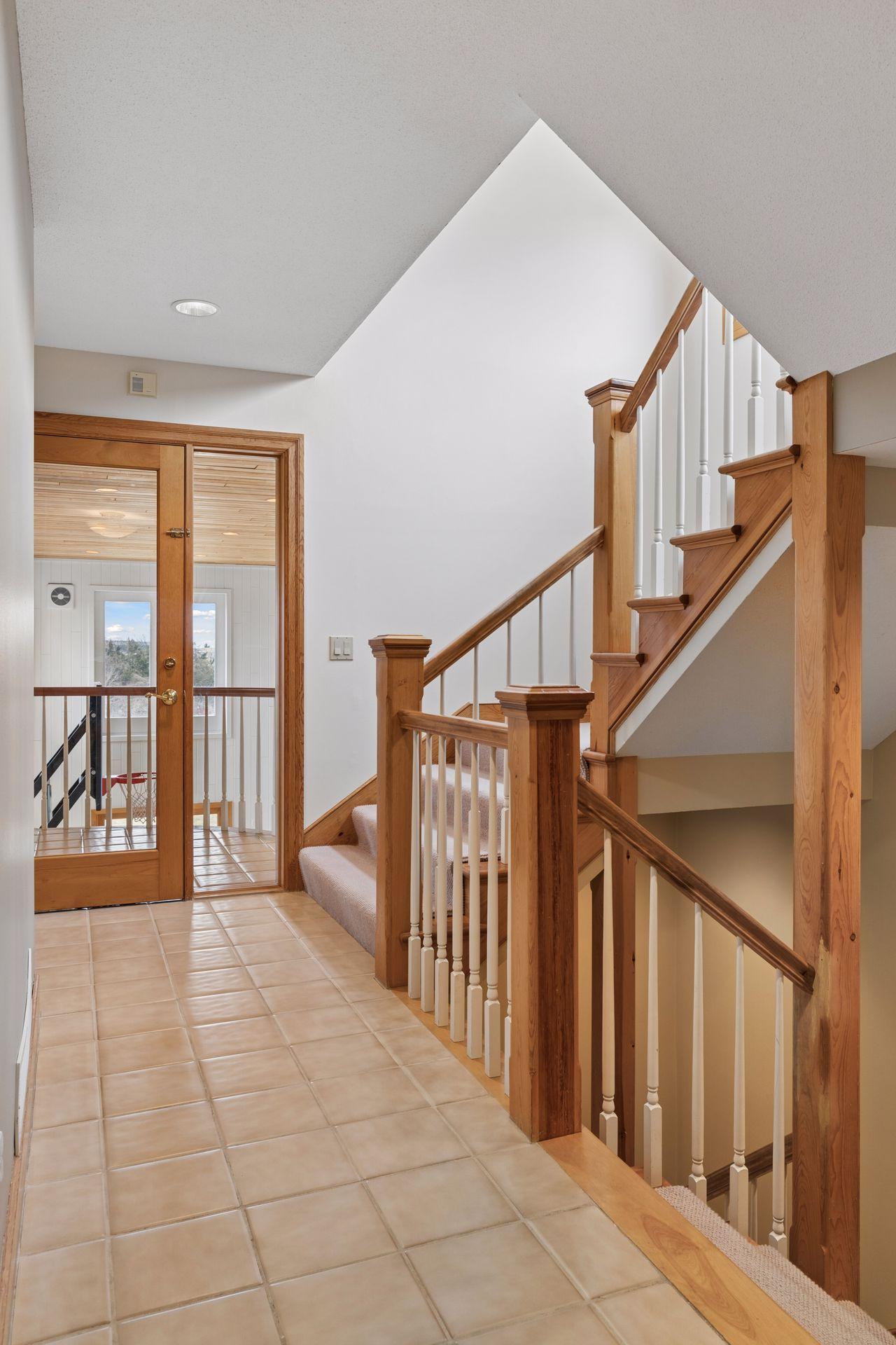 Down the main hallway is where you will find a balcony overlooking the athletic court and the doorway to the exercise room.