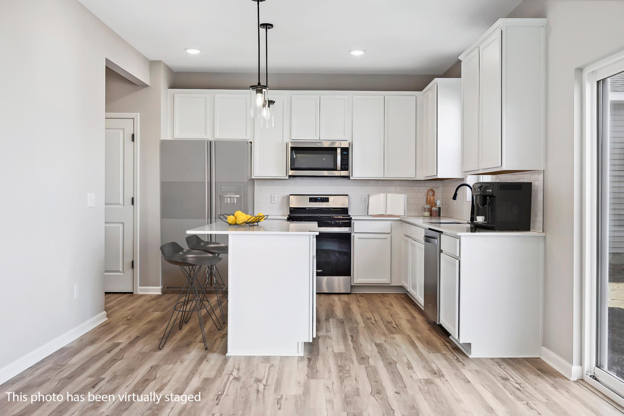 Macalester Kitchen features ample cabinetry and functional layout.jpg