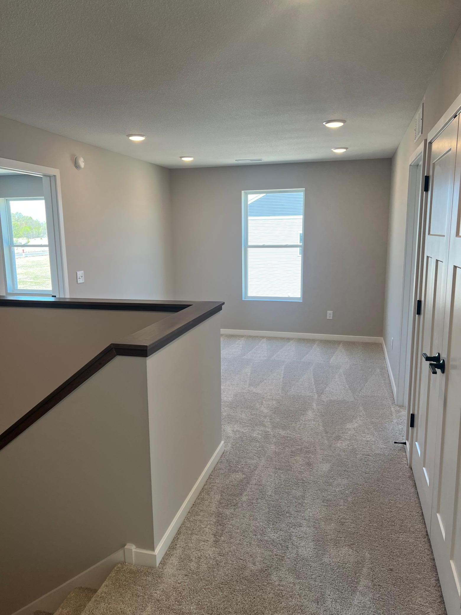 Upstairs loft off of center staircase