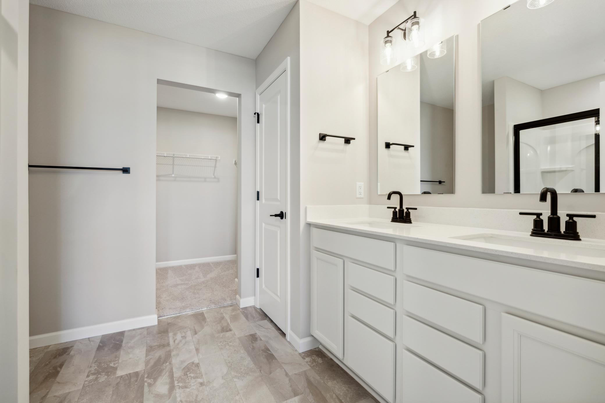 Bright open owners' bathroom
