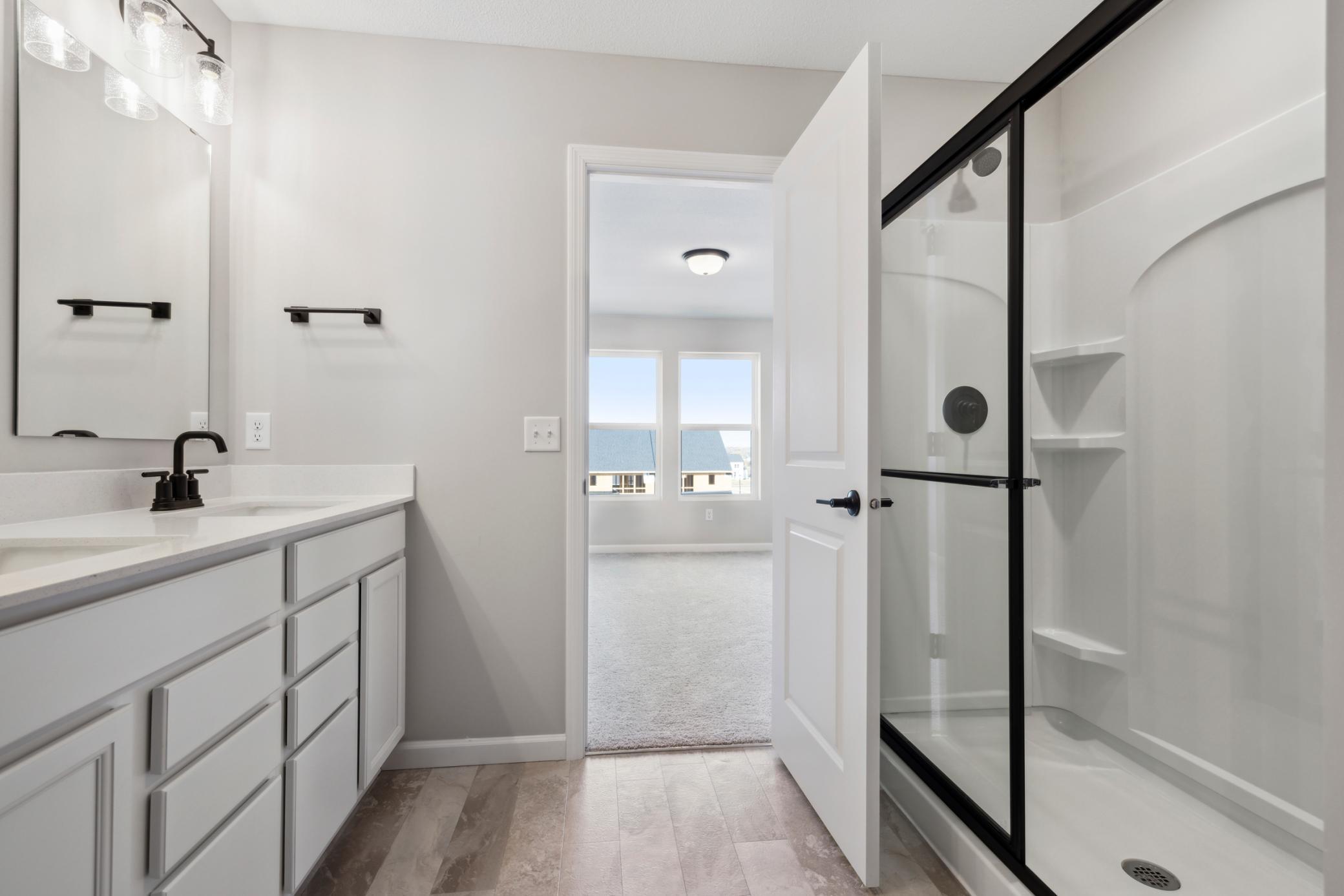 Beautifully designed primary ensuite bathroom offering a private, spa-like retreat