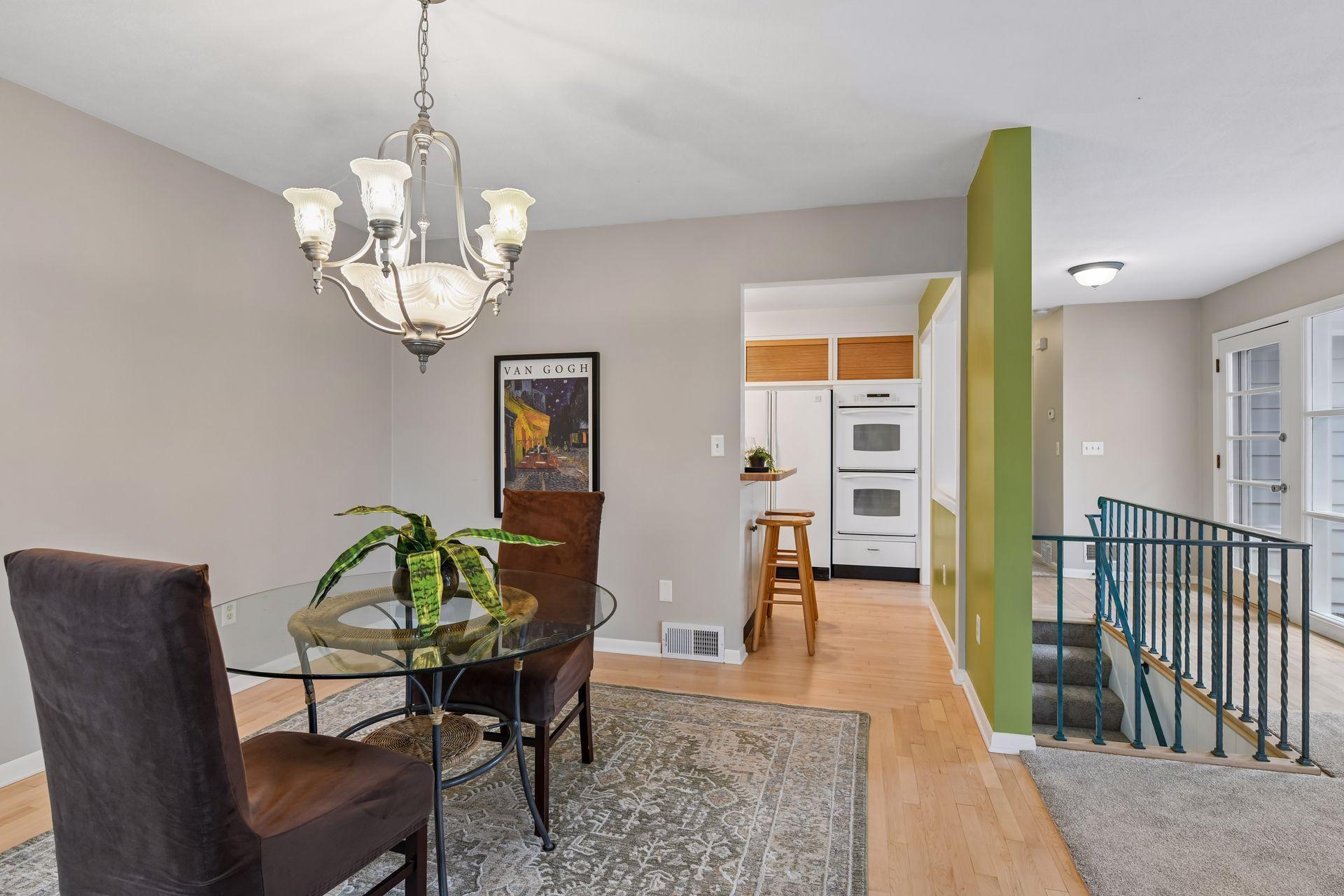 The dining room is handy to the updated kitchen and has lovely views of the front and deck areas.