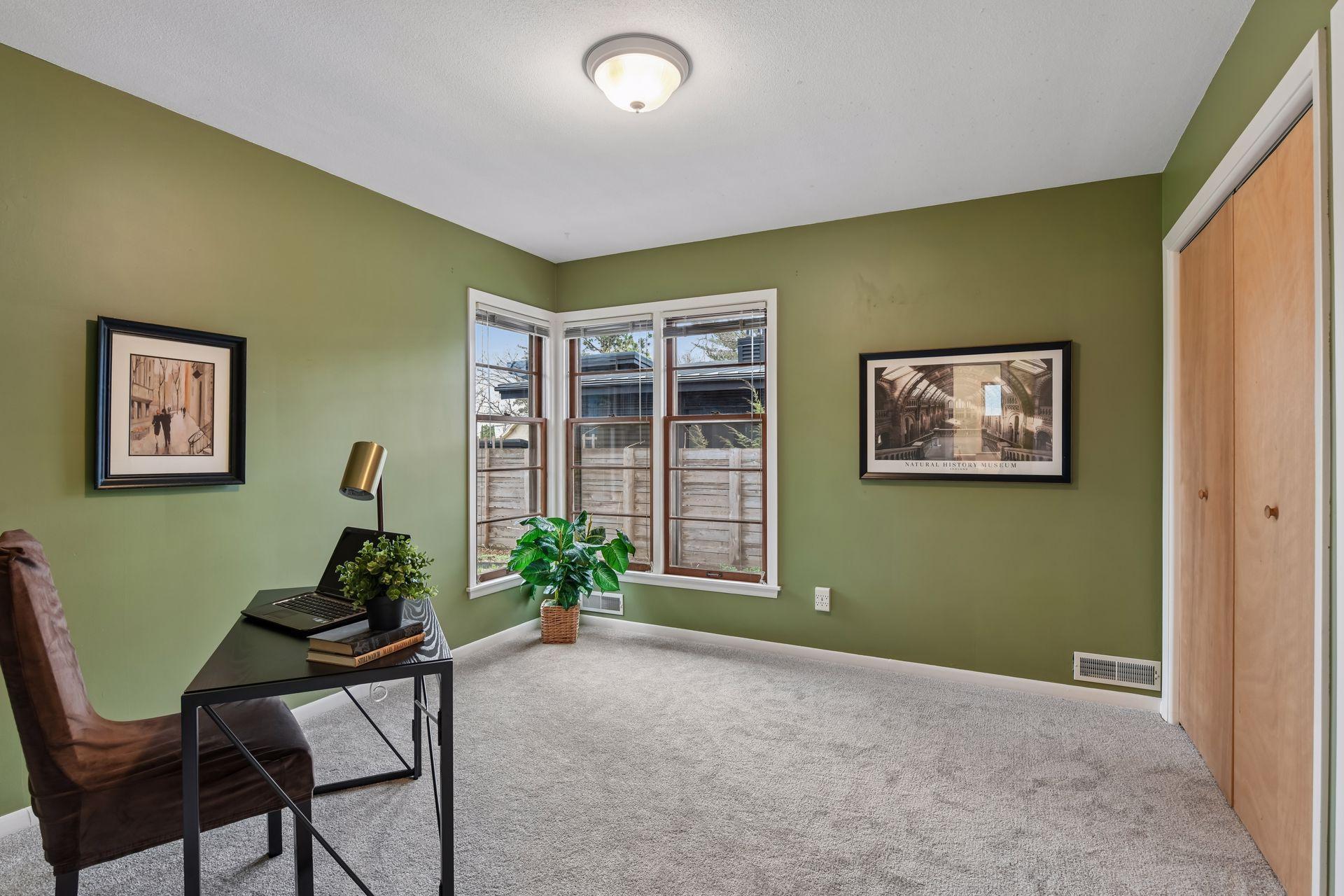 The second bedroom also has a large closet, newer plush carpet and large corner windows.