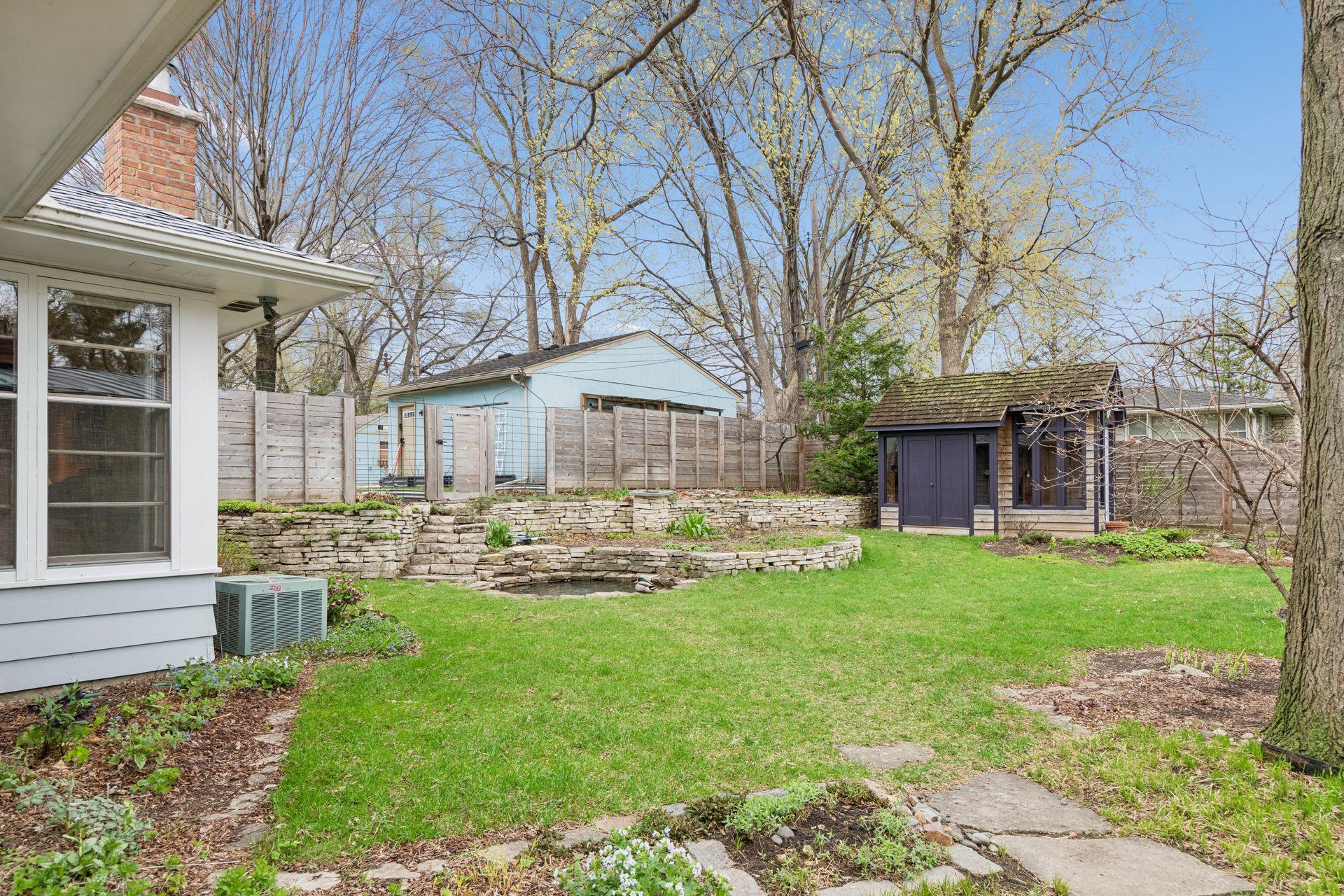 Watch for the resident ducks who love to hang out next to the koi pond and enjoy the peaceful privacy of this beautiful fully fenced yard!