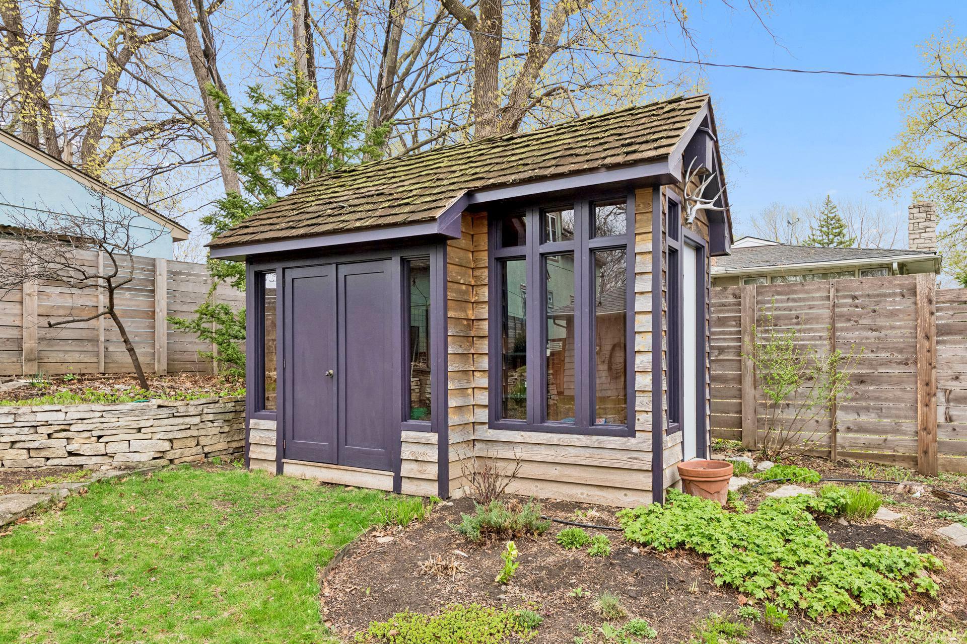 This delightful potting shed is as stylish as it is useful!