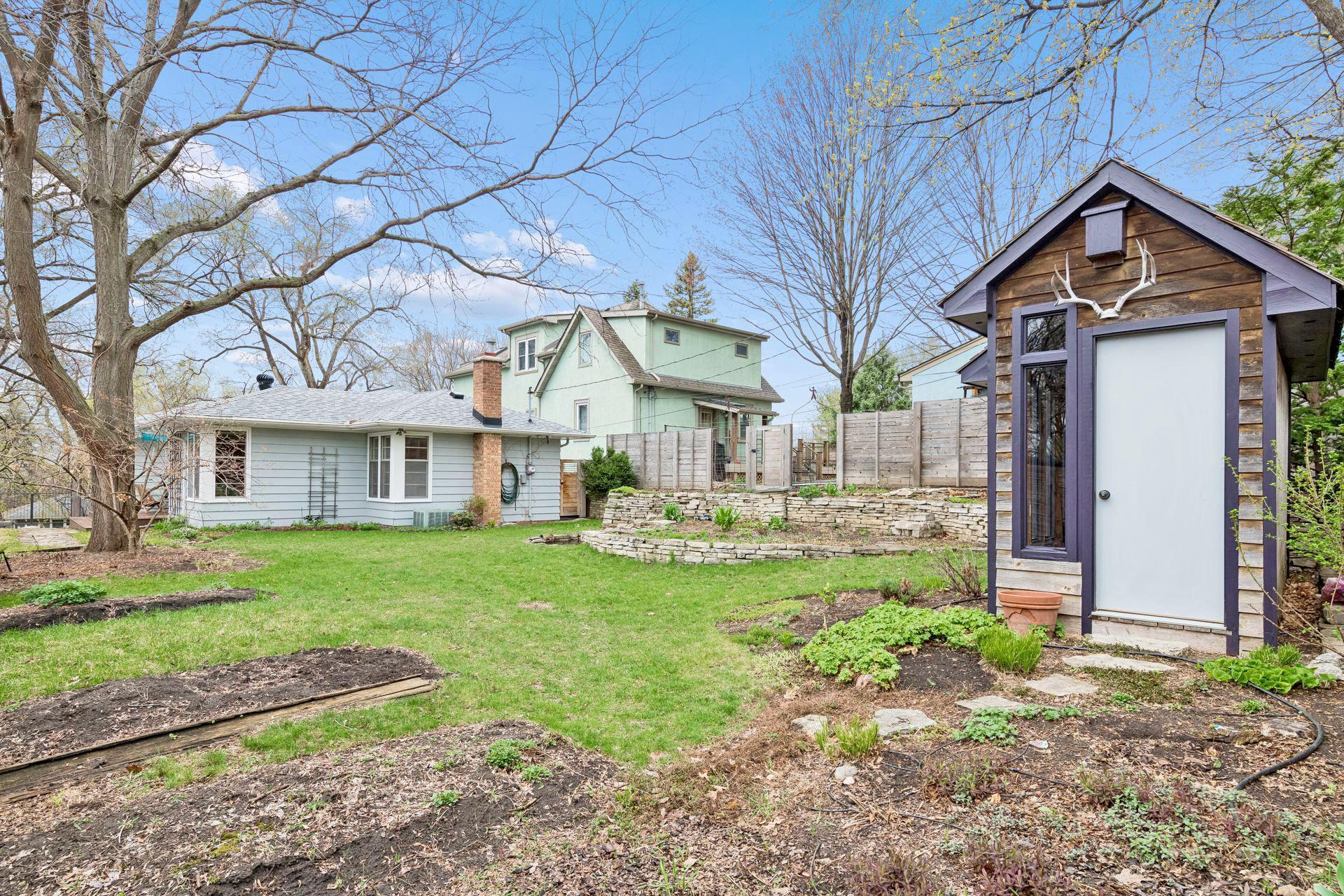 What a delightful fenced yard! A new roof and gutter guards were installed in 2023. A privacy fence was installed in 2022.