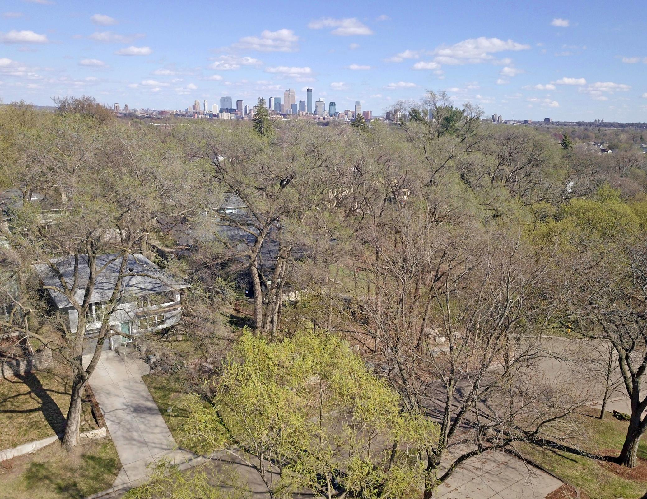 Tucked away in a low-traffic cul-de-sac just a stone's throw to Theodore Wirth Parkway and minutes to downtown Minneapolis, this delightful home is in super convenient location - great for active lifestyles!