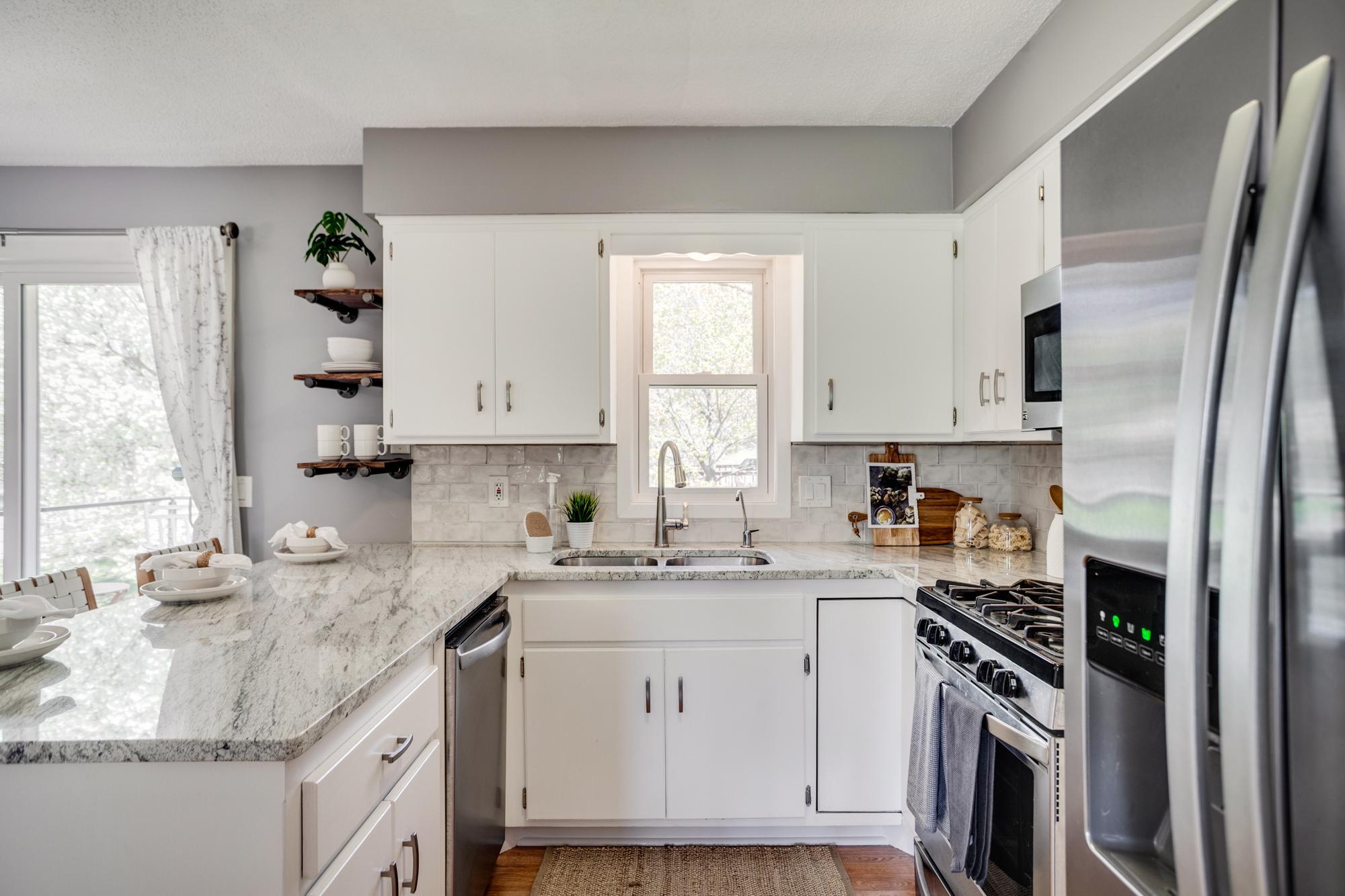 New granite countertops, backsplash, and painted cabinets in 2026