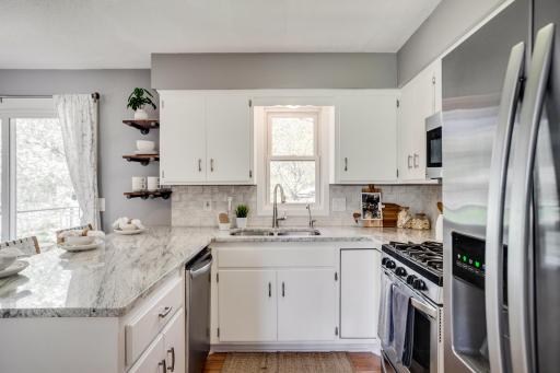 New granite countertops, backsplash, and painted cabinets in 2026