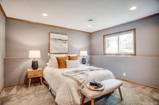 The lower level has also been used as a cozy family room with adjoining office