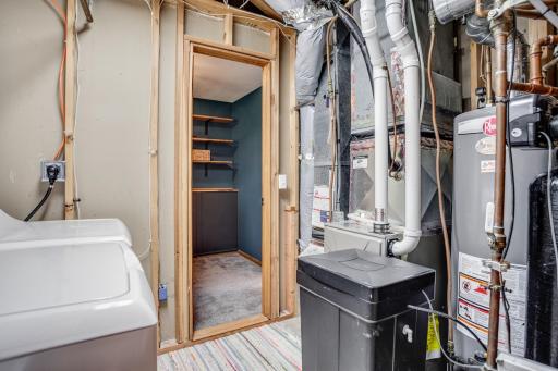 Utility and laundry room with recently updated mechanicals