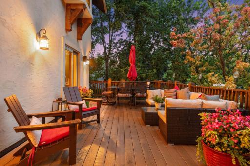 Completing this home is an attached oversized two-car garage with epoxy flooring, storage shed, stunning landscaping, paver patio firepit, and an expansive deck for relaxing or entertaining.