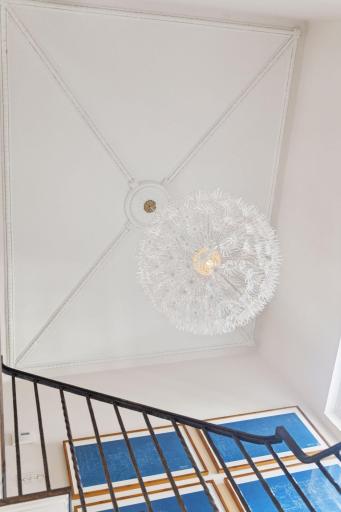 Original plaster work on ceiling in stairway