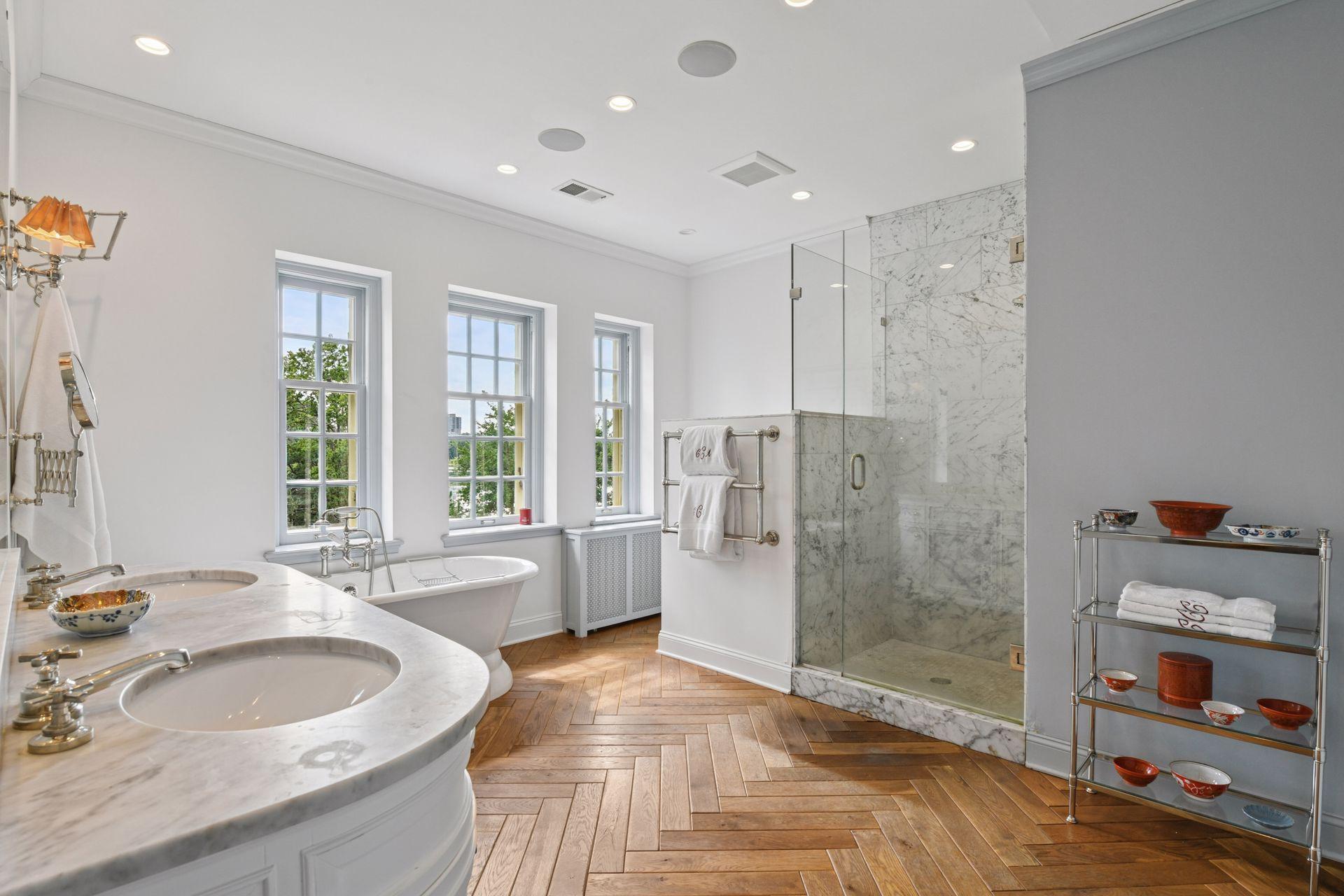 Bright primary bath with large walk in shower