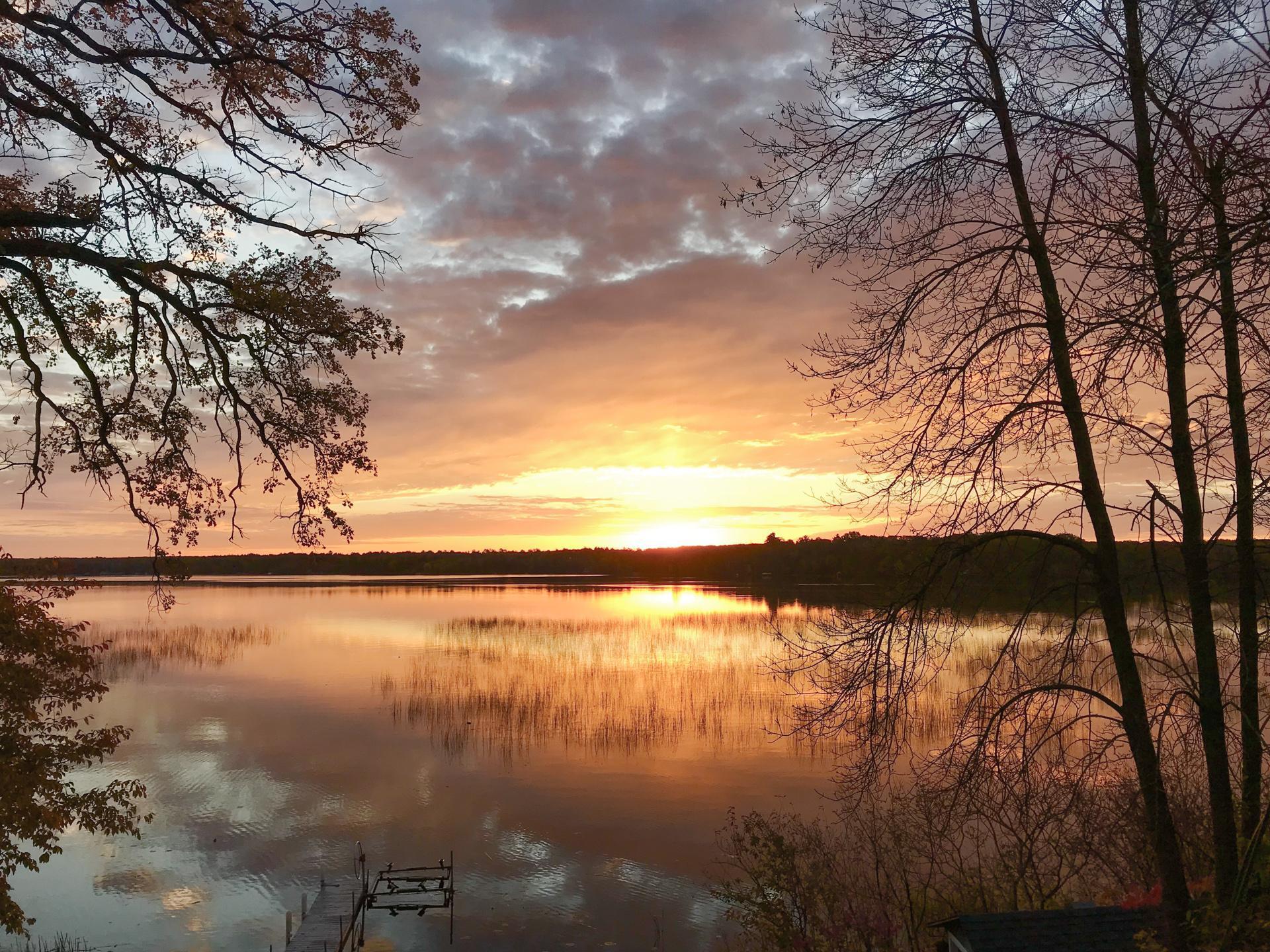 Unwind with stunning sunset colors reflecting across the lake.