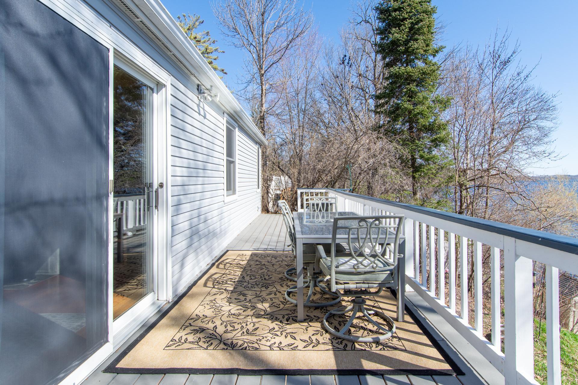 Spacious deck refreshed with new stain and added structural support.
