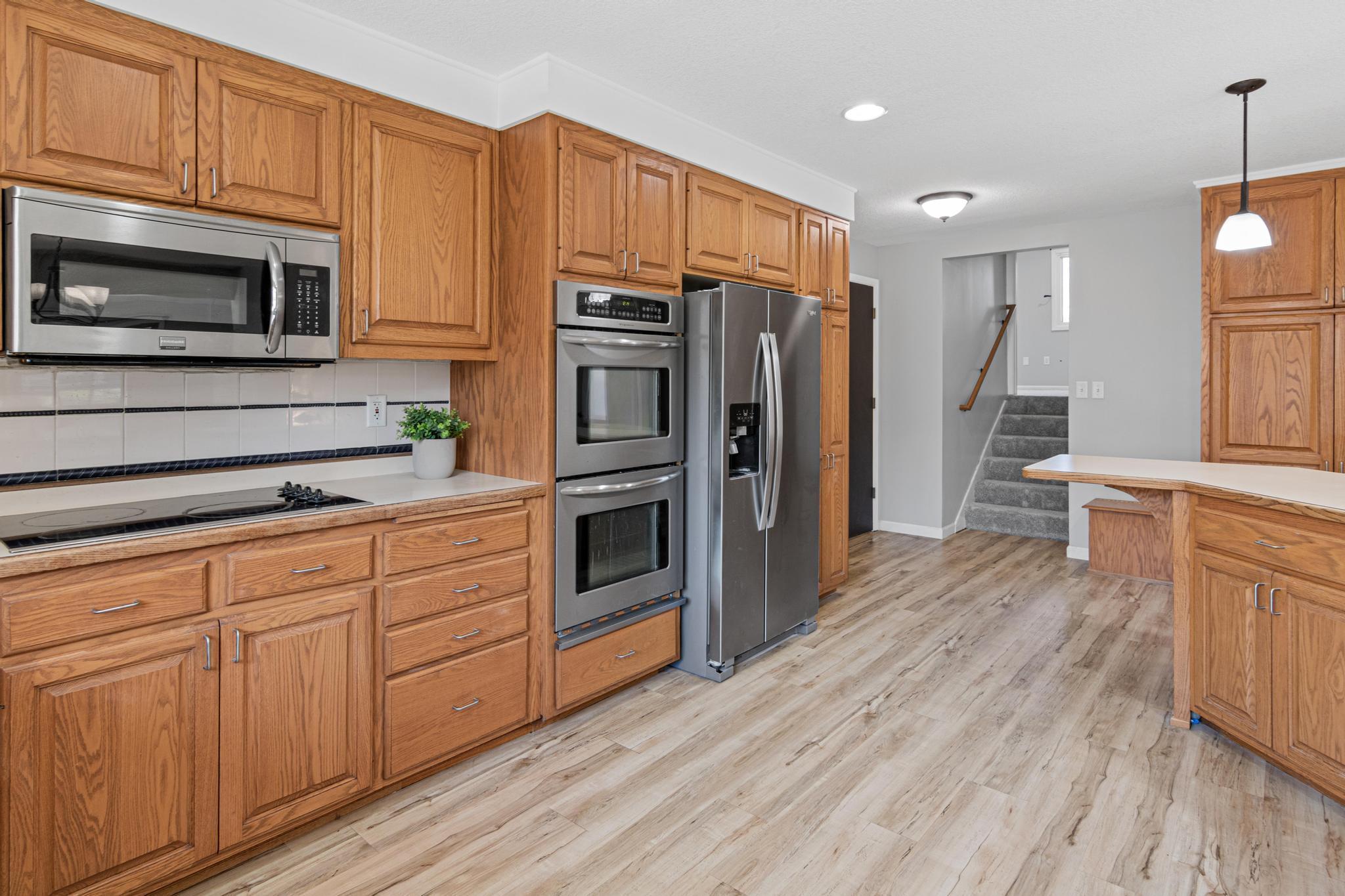 Newer stainless-steel appliances and a double oven- perfect for Thanksgiving.