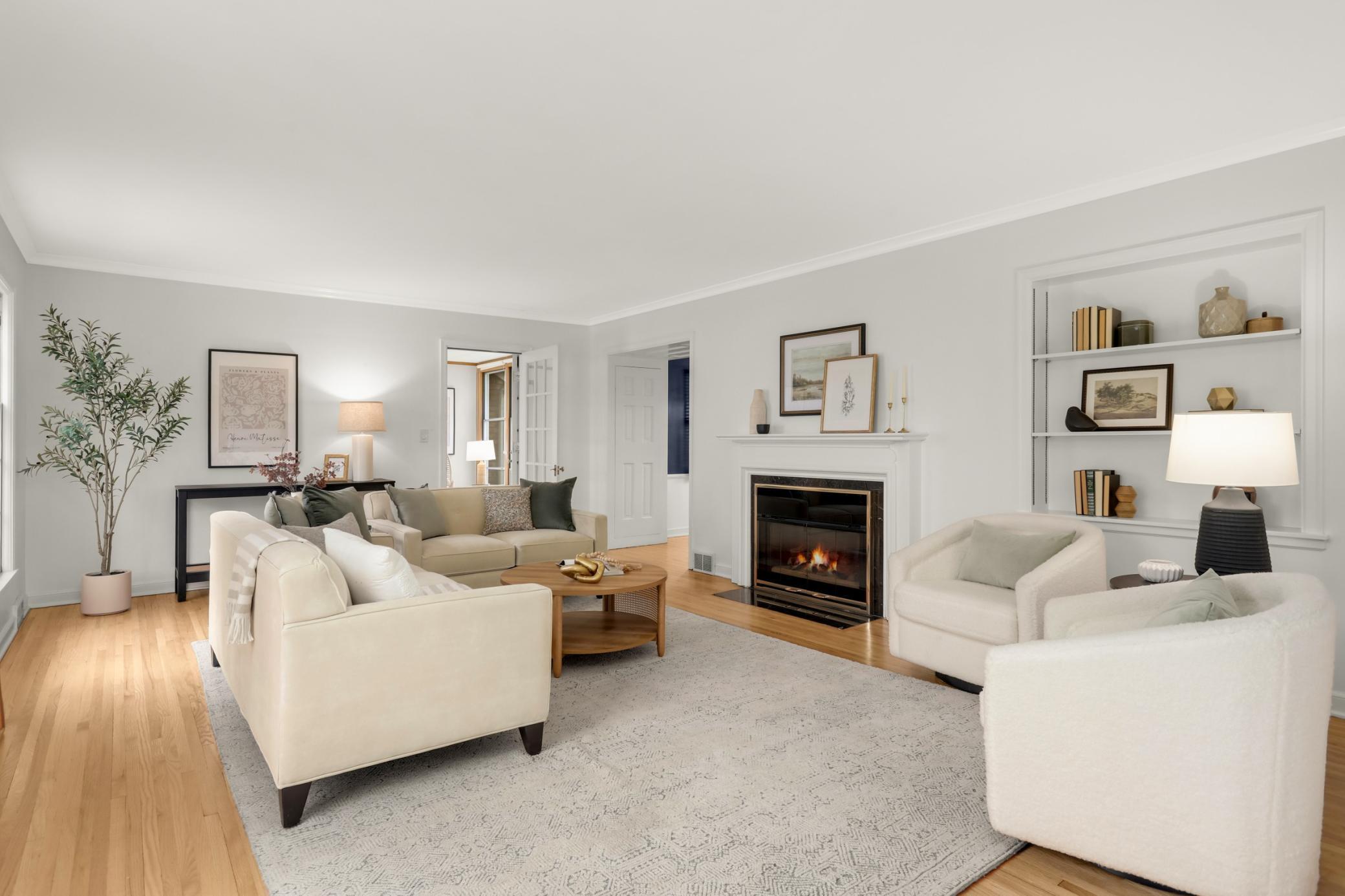 Entertainment sized living room with gas fireplace