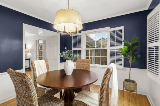Formal dining room with unique hidden closets in the archway
